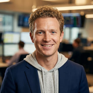 Profile image showing Ryan Brooks, listed as Lead Trading Analyst at Yieldovex